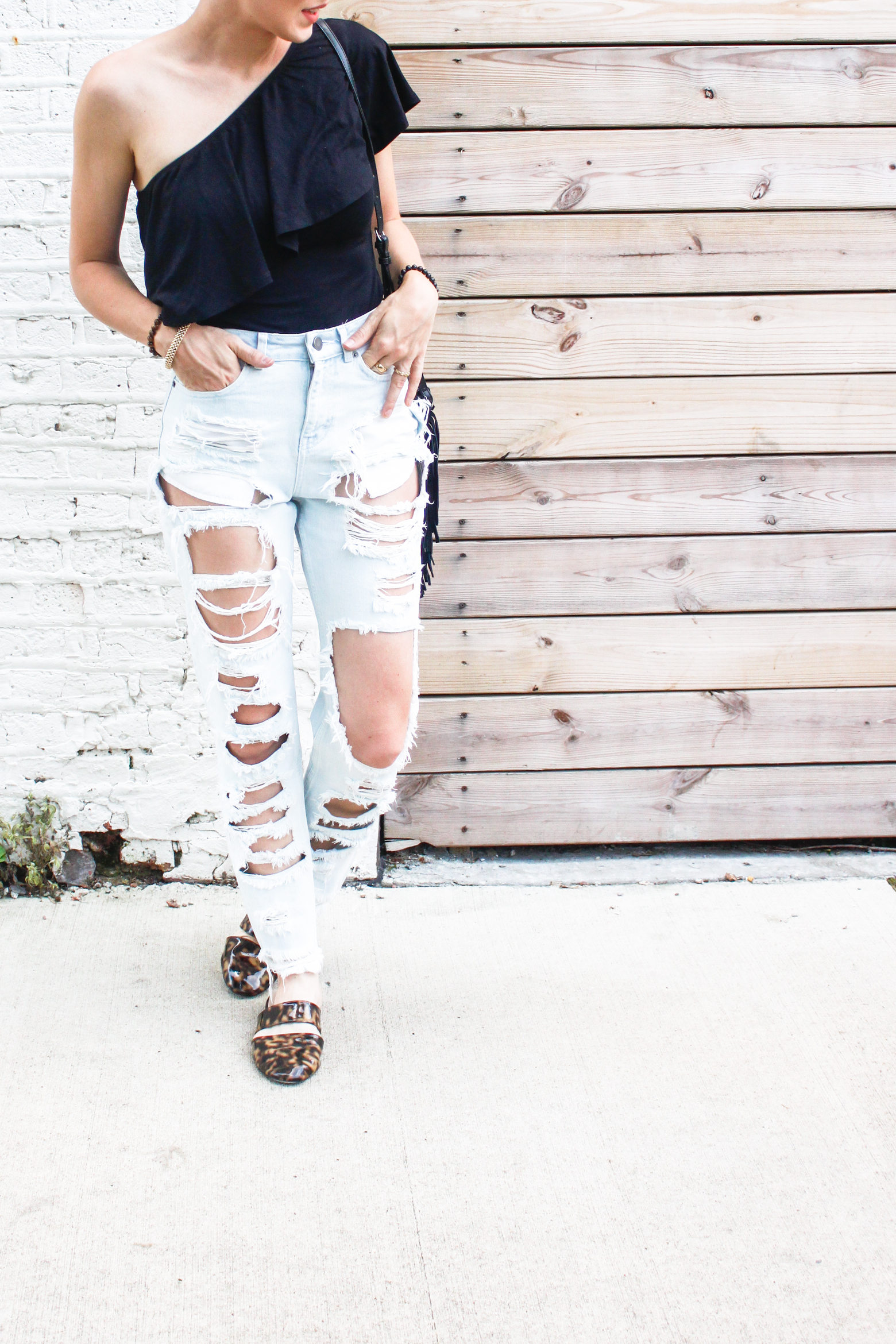 shredded jeans + one shoulder bodysuit – Meg McMillin